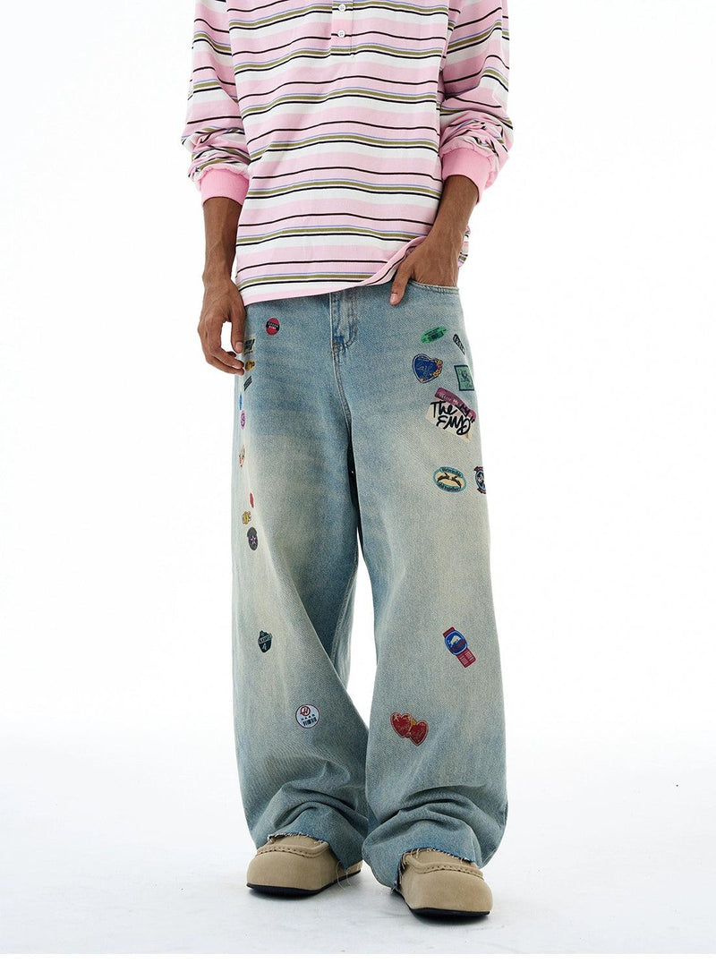 Faded Printed Stickers Wide Leg Jeans