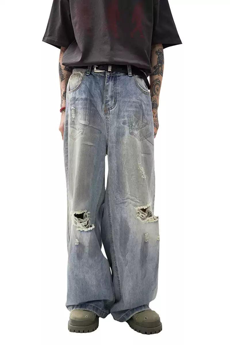 Smudged Ripped Knee Jeans