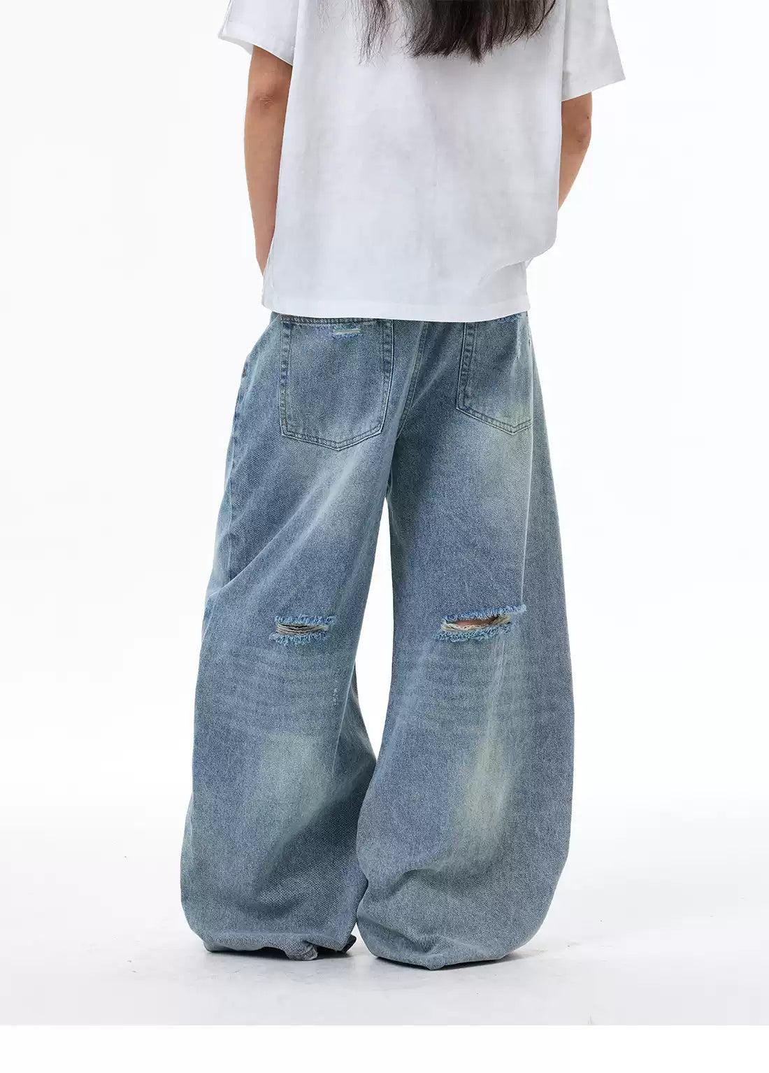 Distressed Faded Curved Jeans