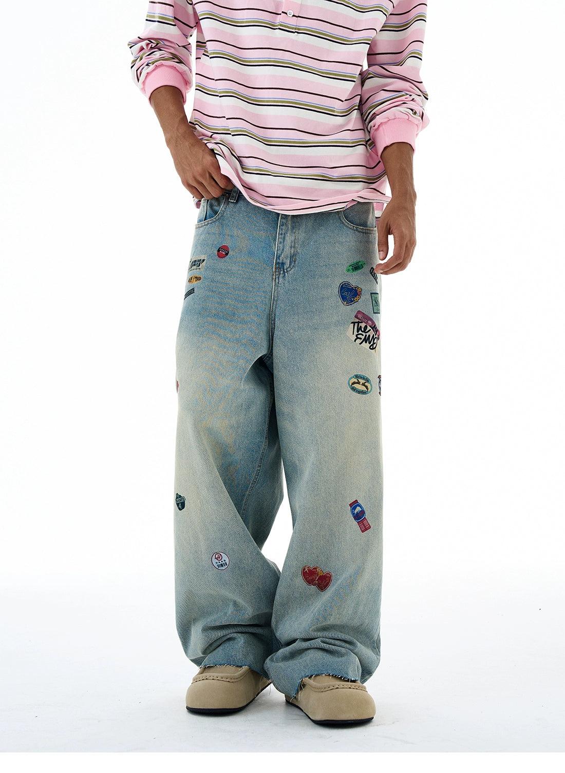 Faded Printed Stickers Wide Leg Jeans