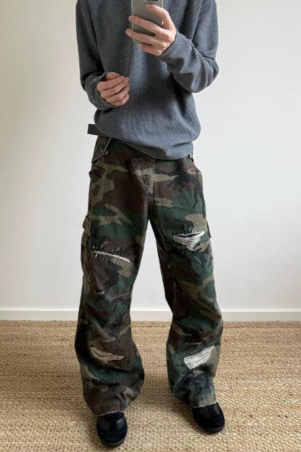 Stitches and Rips Camouflage Jeans