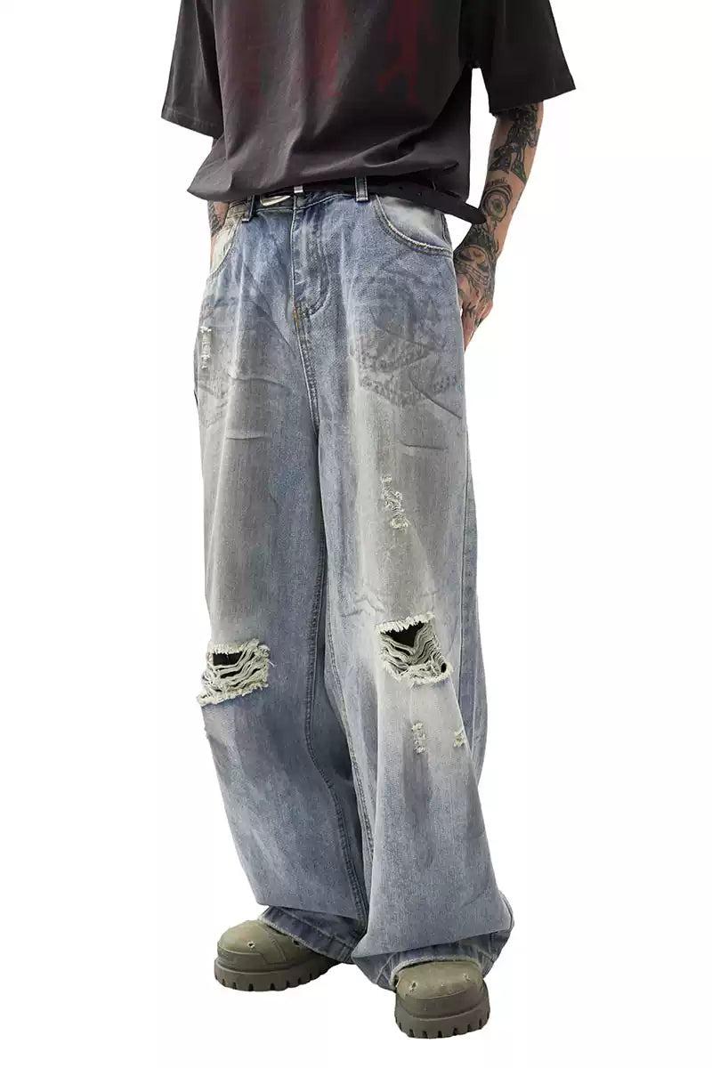 Smudged Ripped Knee Jeans