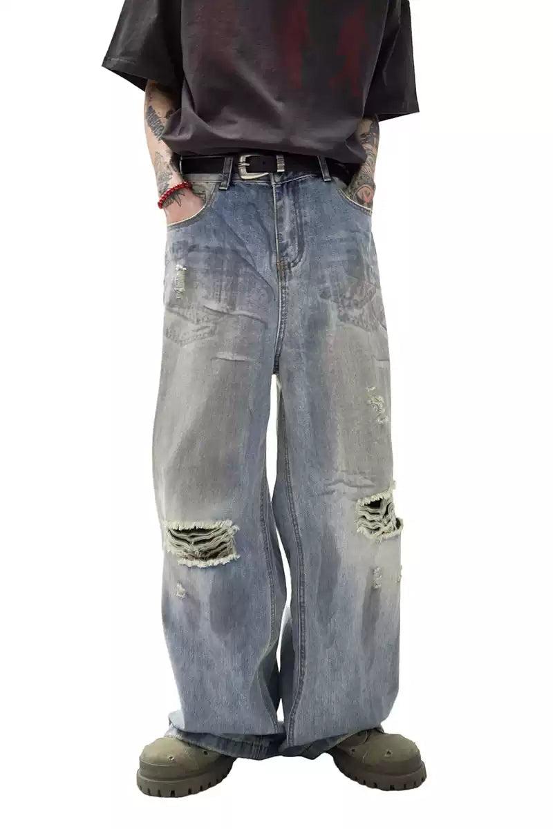 Smudged Ripped Knee Jeans