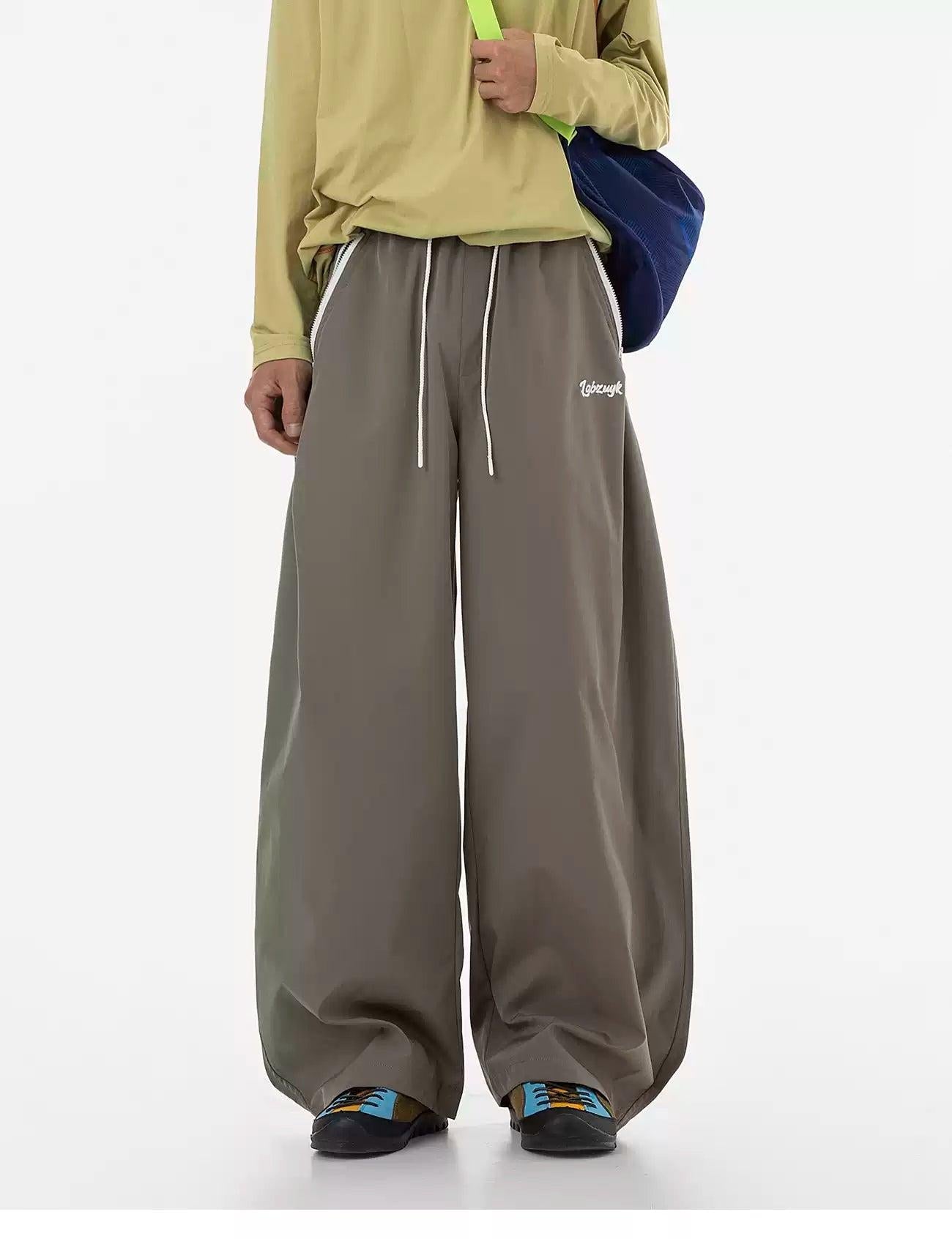 Zipped Pocket Curved Track Pants