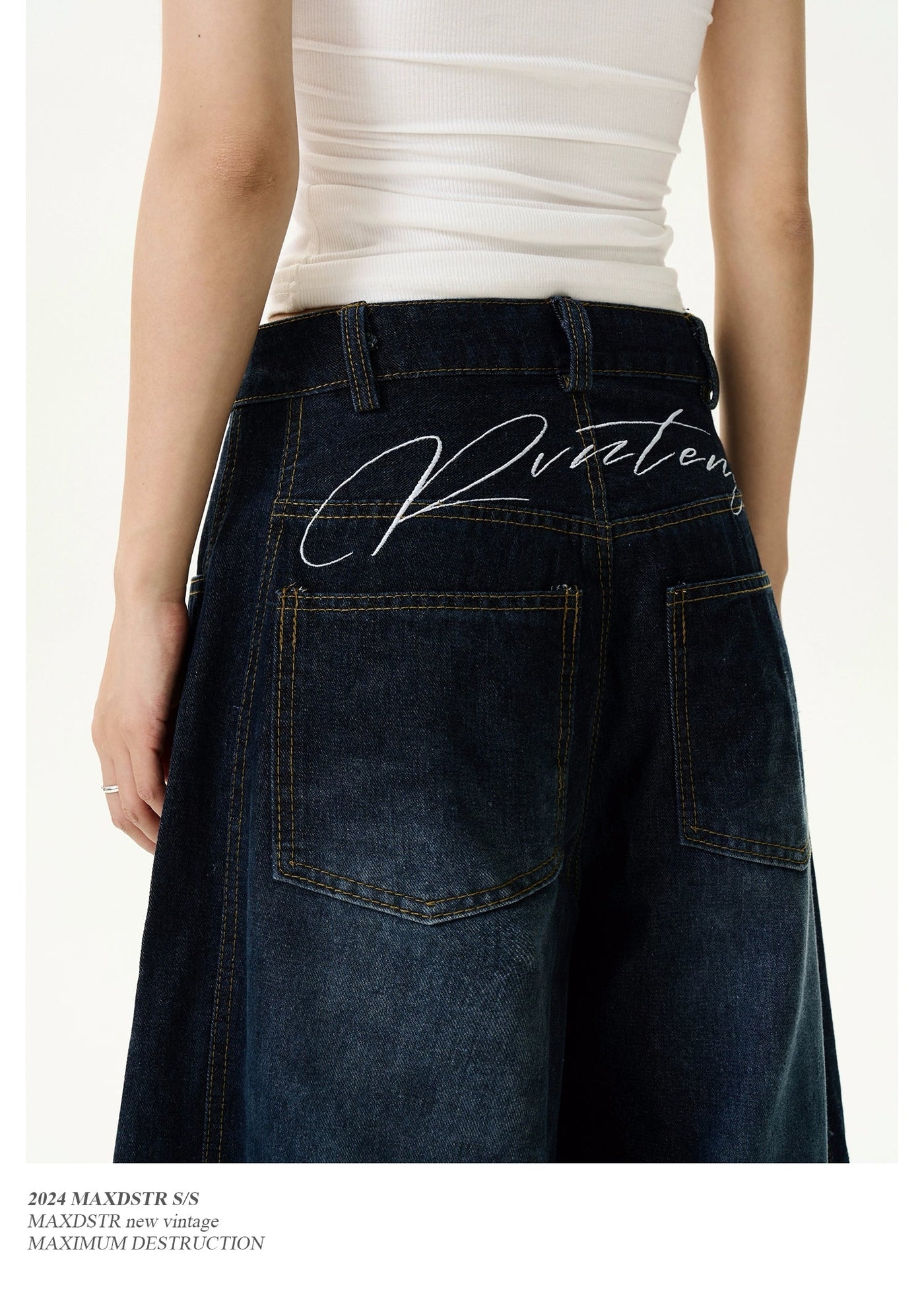 Letter Embroidery Scimitar Jeans